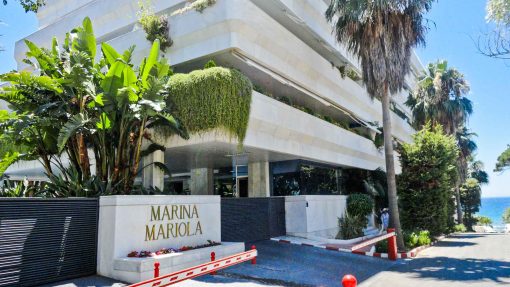 Entrance to the Marina Mariola building on Marbella's Golden Mile.